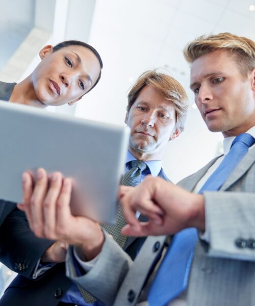 business-professionals-reviewing-tablet-in-modern-2026-01-09-10-52-29-utc (1)
